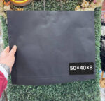 شنط اسود حجم ٤٠×٥٠ طول وعرض