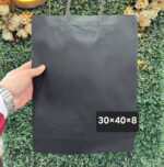 ⁦شنط اسود مقاس ٣٠×٤٠⁩ - الصورة ⁦2⁩